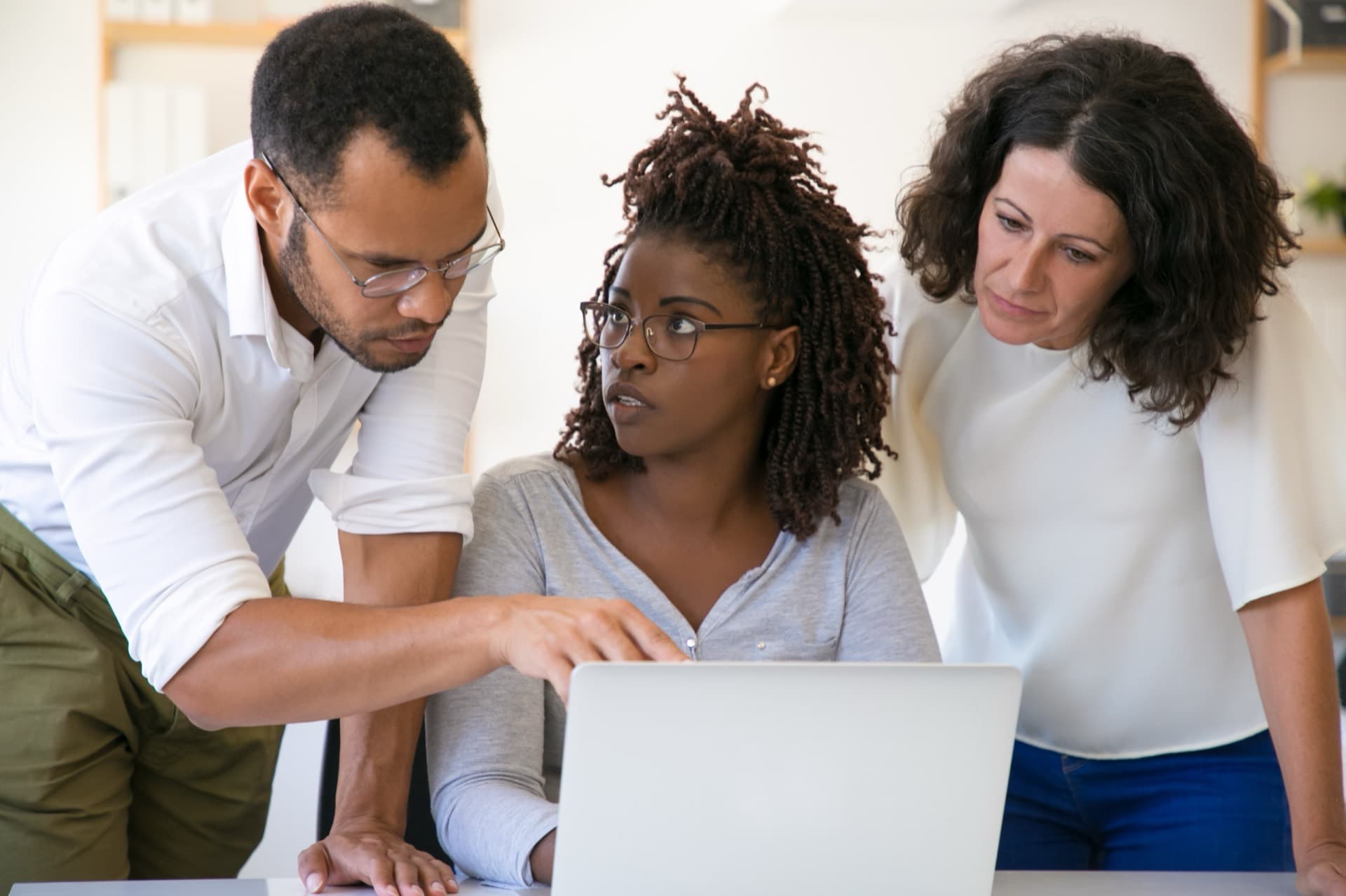 Colleagues discussing corporate software